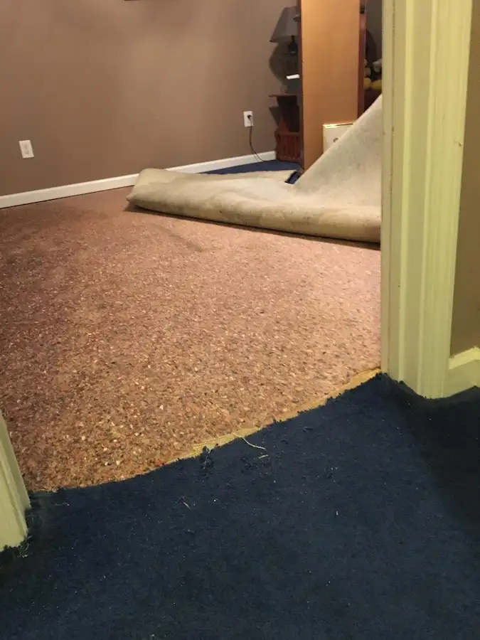 Carpet pad removal revealing water damage during Drying & Dehumidification in Prineville