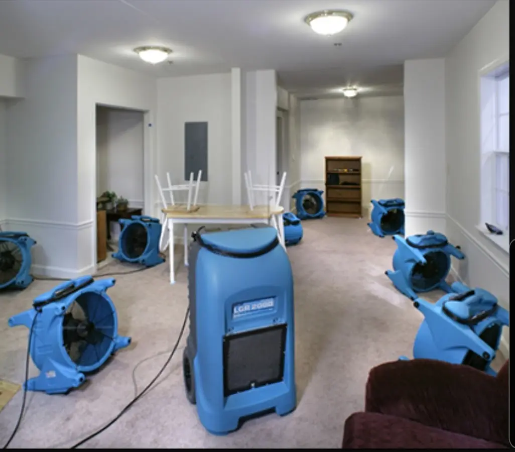Air movers and dehumidifier setup for Water Damage Restoration in Prineville